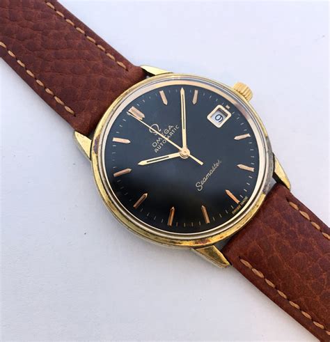 omega vintage seamaster automatic black strap gold|omega seamaster aftermarket rubber strap.